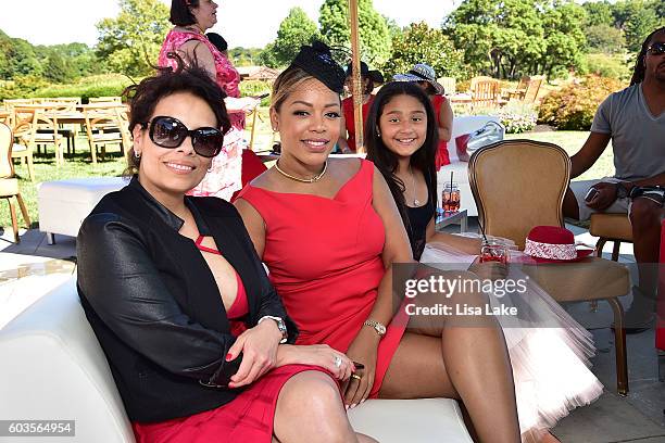 Lealani Shaw, Ruth Garcia and Julieta Erving attend the Dorys Erving Wine Chocolate & Cheese Pairings during the Julius Erving Golf Classic Event at...