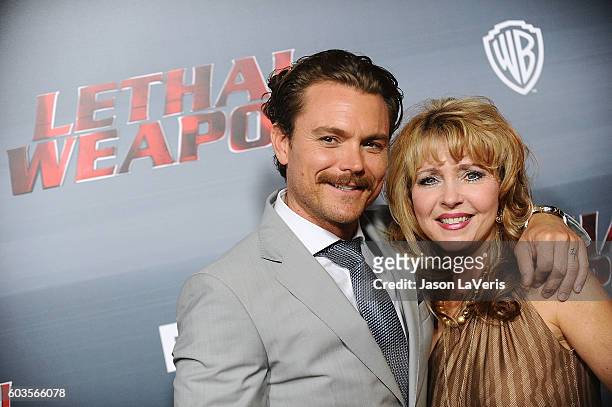 Actor Clayne Crawford and his mother attend the premiere of "Lethal Weapon" at NeueHouse Hollywood on September 12, 2016 in Los Angeles, California.