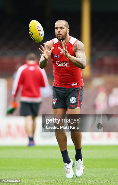 Lance Franklin of the Swans handles the ball during a Sydney Swans AFL training session at Sydney Cricket Ground on September 13, 2016 in Sydney,...