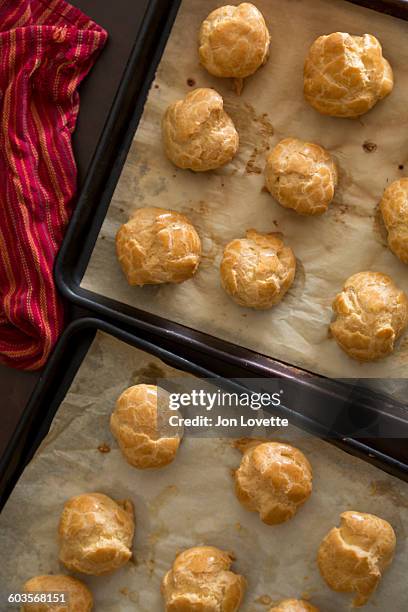 making cream puffs - eclair stock pictures, royalty-free photos & images