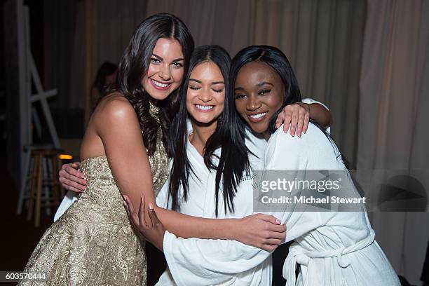 Miss Teen USA 2015 Katherin Haik, Miss Universe 2016 Pia Wurtzbach and Miss USA 2016 Deshauna Barber attend the Sherri Hill fashion show during...