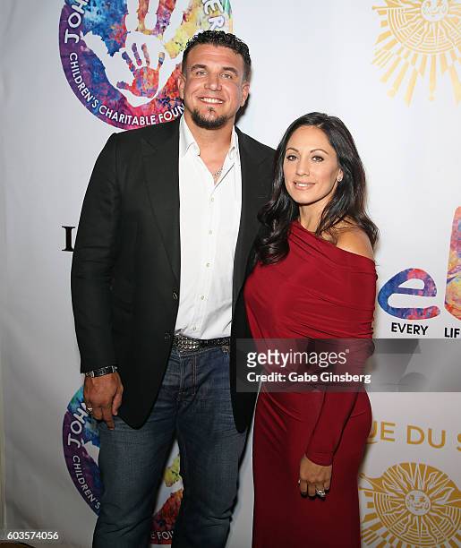 Mixed martial artist Frank Mir and his wife Jennifer Mir attend Criss Angel's HELP charity event at the Luxor Hotel and Casino benefiting pediatric...