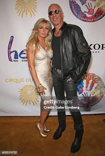 Suzette Snider and her husband, singer Dee Snider of Twisted Sister, attend Criss Angel's HELP charity event at the Luxor Hotel and Casino benefiting...