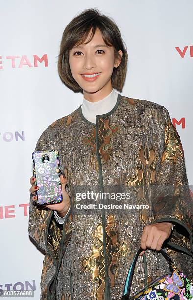 Actress Zhang Li poses backstage at the Vivienne Tam fashion show during New York Fashion Week: The Shows at The Arc, Skylight at Moynihan Station on...