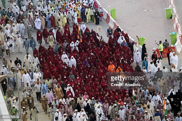 Prospective pilgrims on their way to Jamarat to stone the devil as part of the annual Islamic Hajj pilgrimage during the Eid Al Adha in Mecca, Saudi...