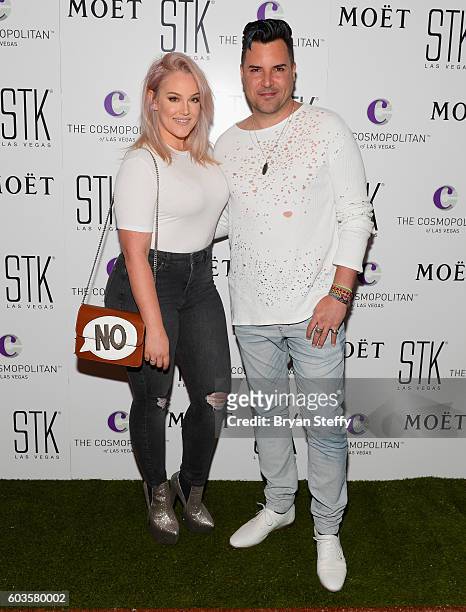 Dancer Lacey Schwimmer and musician Frankie Moreno attend the fourth annual White Party hosted by Heather McDonald at STK at The Cosmopolitan of Las...