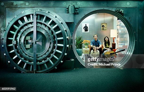 family living in a vault - safe haven film stock-fotos und bilder