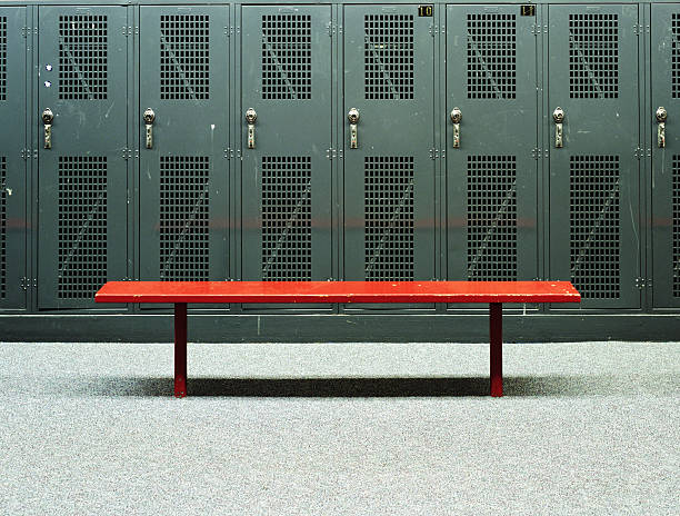 bench in locker room - locker room stock pictures, royalty-free photos & images