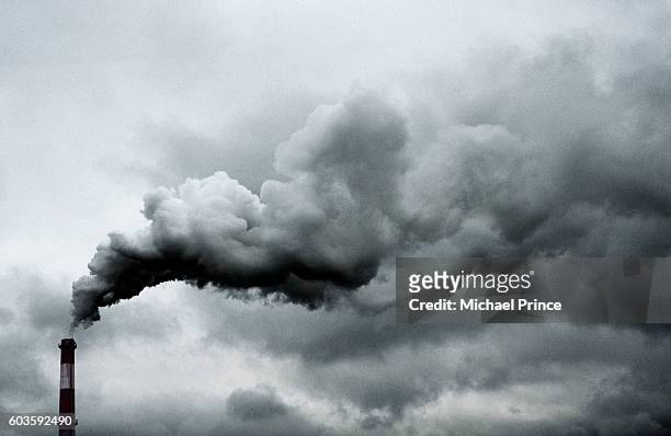smoke billowing from smokestack - air pollution stock pictures, royalty-free photos & images