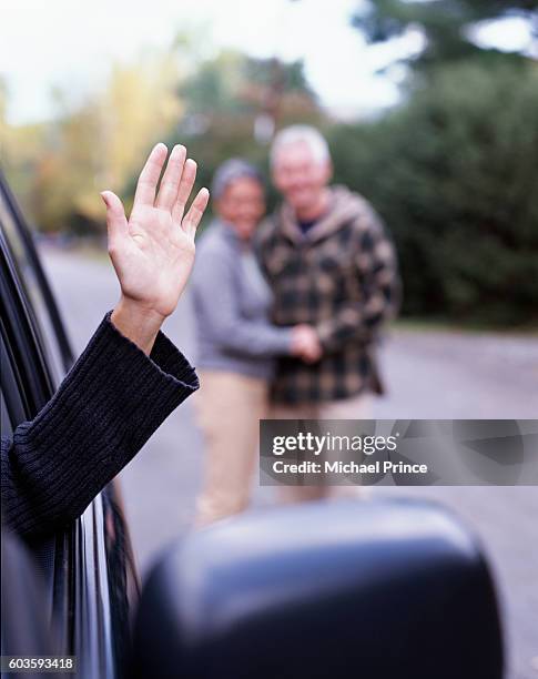 waving goodbye - waving goodbye stock pictures, royalty-free photos & images