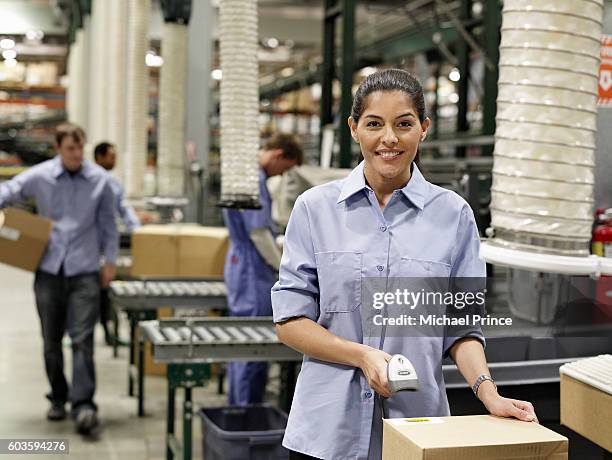 240 Factory Worker In Assembly Line Boxes Stock Photos, High-Res ...
