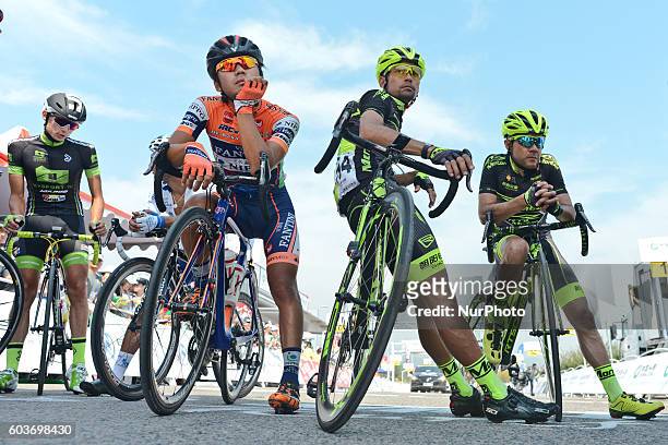 Riders awaiting for a rescheduled start to the third stage, 114.7 km Chongqing Banan circuit race, during the 2016 Tour of China 1. Chongqing is a...