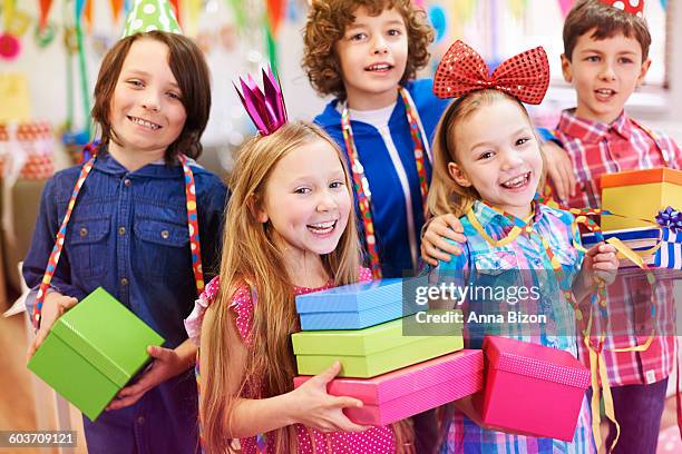 time to open birthday presents. debica, poland - birthday wishes funny stock pictures, royalty-free photos & images