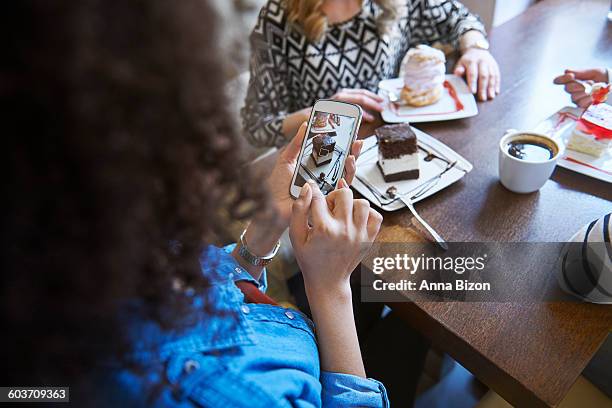 i will eat but first i have to take this photo. debica, poland - push cake stock pictures, royalty-free photos & images