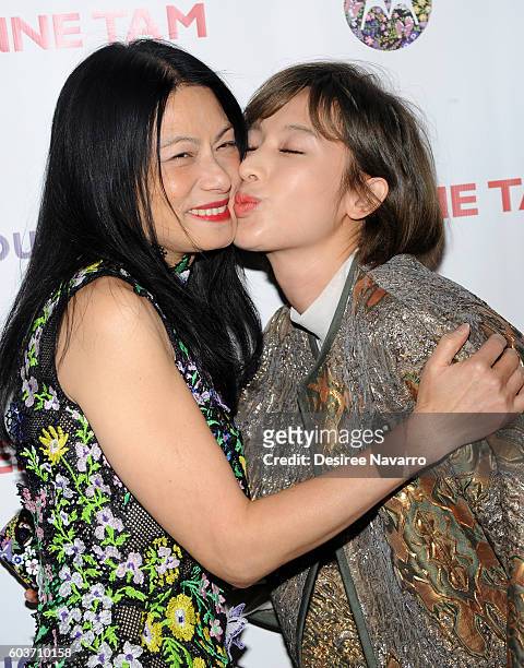 Designer Vivienne Tam poses backstage with actress Zhang Li at the Vivienne Tam fashion show during New York Fashion Week: The Shows at The Arc,...