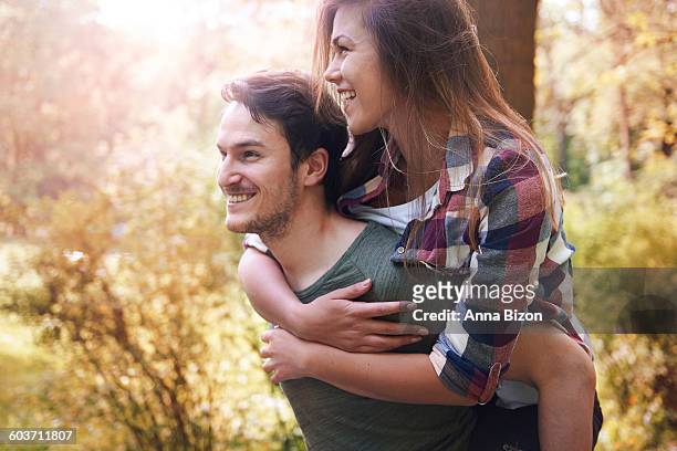 young couple in the wild place. cracow, poland - krakow park stock pictures, royalty-free photos & images