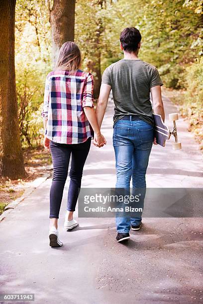 take my hand and walk with me. cracow, poland - krakow park stock pictures, royalty-free photos & images
