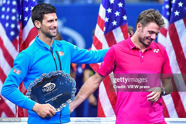 Novak Djokovic of Serbia congratulates Stan Wawrinka of Switzerland after the latters victory during their Men's Singles Final Match of the 2016 US...