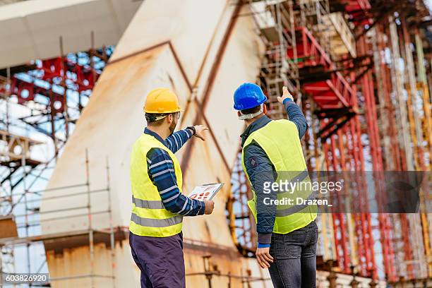 there are some problems with this construction - bridge built structure stock pictures, royalty-free photos & images