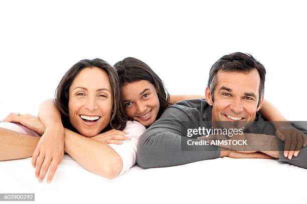 happy parents with their single child - toothy smile stock pictures, royalty-free photos & images