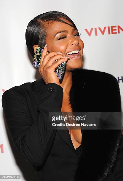 Singer Christina Milian poses backstage at the Vivienne Tam fashion show during New York Fashion Week: The Shows at The Arc, Skylight at Moynihan...