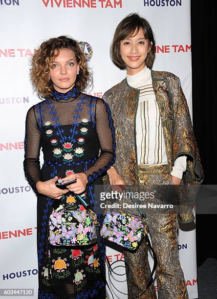 Actresses Camren Bicondova poses with Zhang Li backstage at the Vivienne Tam fashion show during New York Fashion Week: The Shows at The Arc,...