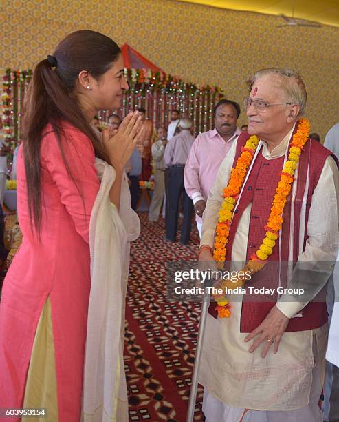 Murli Manohar Joshi and AAP MLA Alka Lamba during Bhumi Pujan of Dharmik Leela Commettee at Red Fort Lawn in New Delhi.