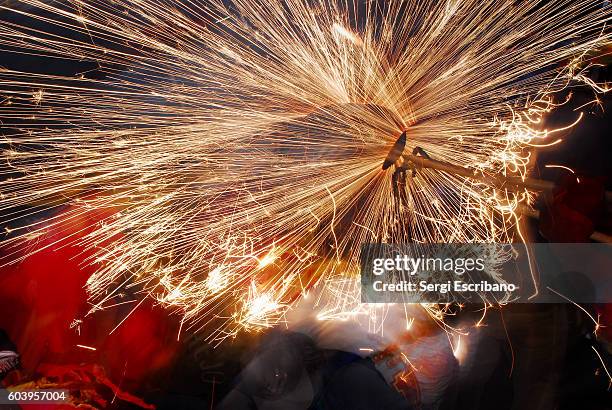 explosion of a firecracker - correfoc stockfoto's en -beelden