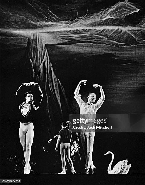 Choreographer George Balanchine coaching dancer Edward Villella in Swan Lake, 1964.
