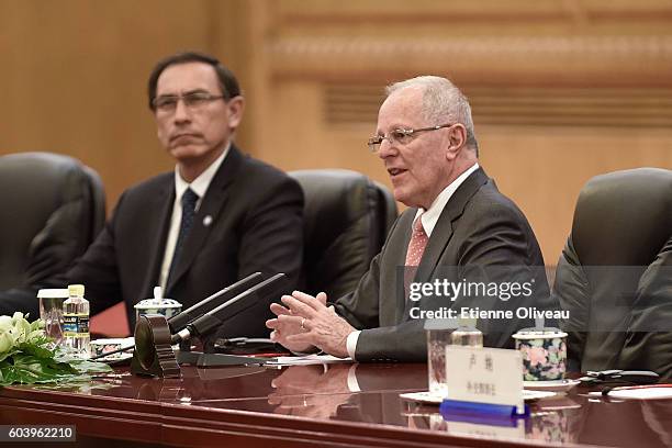 Peruvian President Pedro Pablo Kuczynski speeks a during a meeting with Chinese President Xi Jinping at the Great Hall of the People on September 13,...