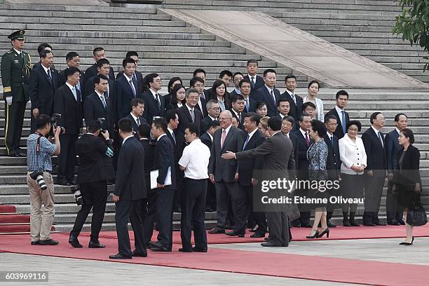 Chinese President Xi Jinping welcomes Peruvian President Pedro Pablo Kuczynski during a welcoming ceremony outside the Great Hall of the People on...