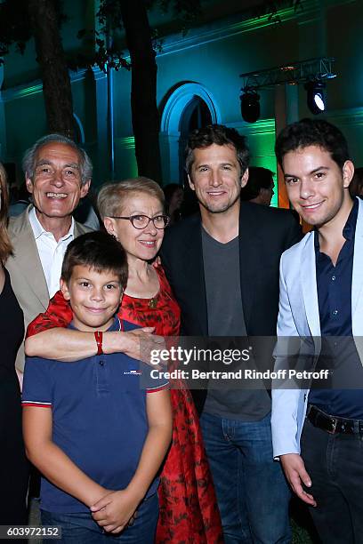 Actor of the movie Guillaume Cannet poses with Grand sons of Emile Zola in which he plays the role, Martine Le Blond-Zola, her brother Bernard Le...