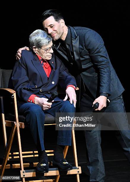 Entertainer Jerry Lewis is hugged by illusionist Criss Angel during Criss Angel's HELP charity event at the Luxor Hotel and Casino benefiting...