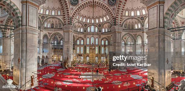 panoramic view of interior of fatih mosque - fatih mosque stock pictures, royalty-free photos & images