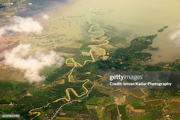 aerial view of the mekong delta in southern vietnam - mekong river stock-fotos und bilder