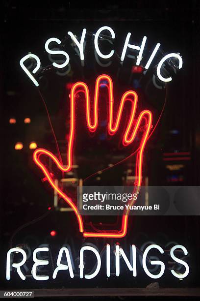 a neon sign on broadway - divination stockfoto's en -beelden