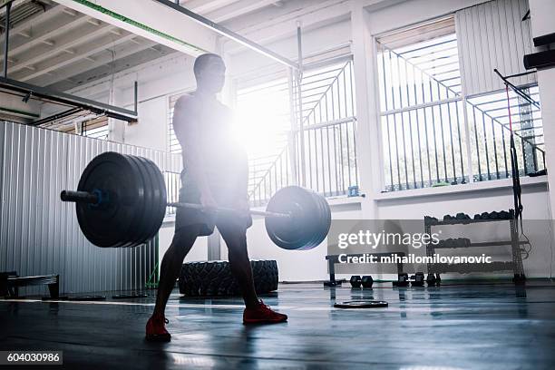 deadlifts - weightlifting stock pictures, royalty-free photos & images