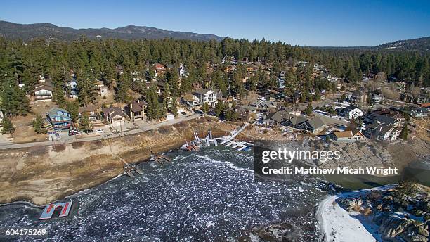 aerial views over big bear lake, california. - big bear lake stock-fotos und bilder