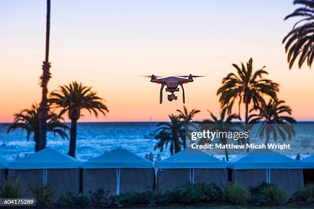 a drone hovers over catalina's descanso beach - descanso beach club stock pictures, royalty-free photos & images