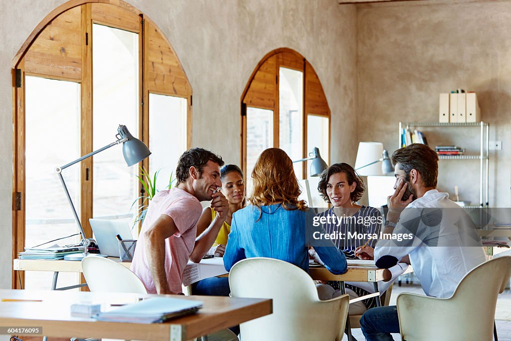 Creative business people discussing in office