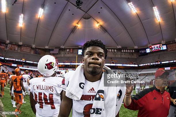 Lamar Jackson of the Louisville Cardinals walks off the field after the game against the Syracuse Orange on September 9, 2016 at The Carrier Dome in...