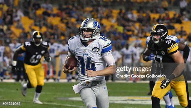 Quarterback Jake Rudock of the Detroit Lions runs with the football during a National Football League preseason game against the Pittsburgh Steelers...