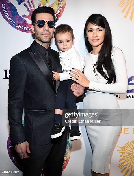 Illusionist Criss Angel, his son Johnny Crisstopher Sarantakos and his mother Shaunyl Benson attend Criss Angel's HELP charity event at the Luxor...