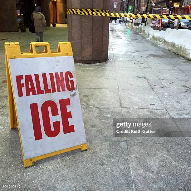 extreme weather - blizzard  - snow melting on sidewalk stock pictures, royalty-free photos & images