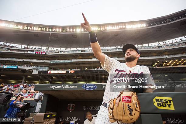 Trevor Plouffe of the Minnesota Twins looks on against the Detroit Tigers on August 24, 2016 at Target Field in Minneapolis, Minnesota. The Tigers...