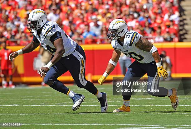 Defenders Corey Liuget and Manti Te'o of the San Diego Chargers get set on defense against the Kansas City Chiefs during the first half on September...