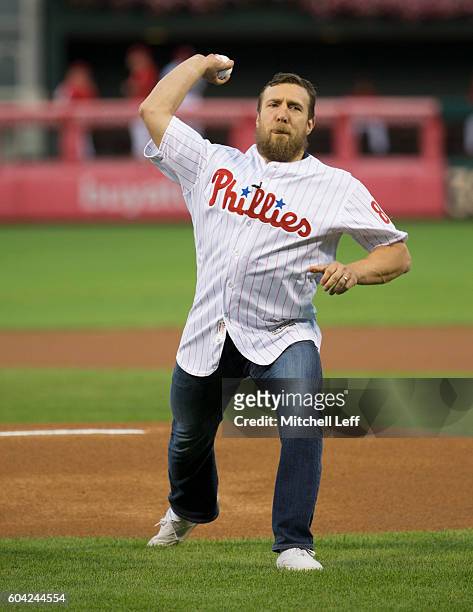 Wrestler Daniel Bryan throws out the first pitch prior to the game between the Pittsburgh Pirates and Philadelphia Phillies at Citizens Bank Park on...