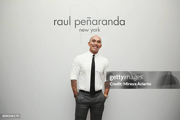 Fashion designer Raul Penaranda poses backstage with models before the Raul Panaranda show during Style360 NYFW September 2016 at Metropolitan West...