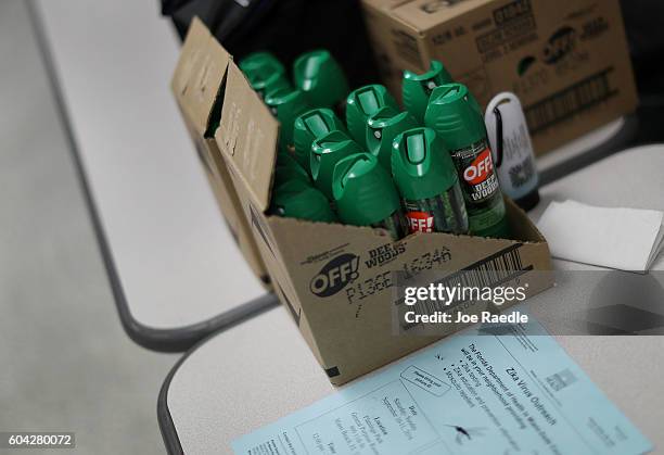 Cans of mosquito repellent are seen as the Florida Department of Health gives free Zika virus tests at a temporary clinic setup at the Miami Beach...