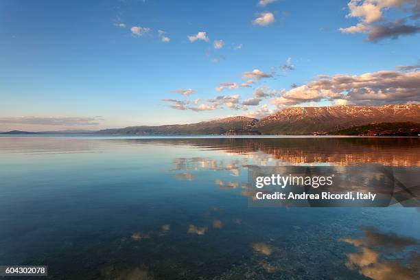 lake ohrid scenery at sunset, pogradec, albania - ohrid stock pictures, royalty-free photos & images